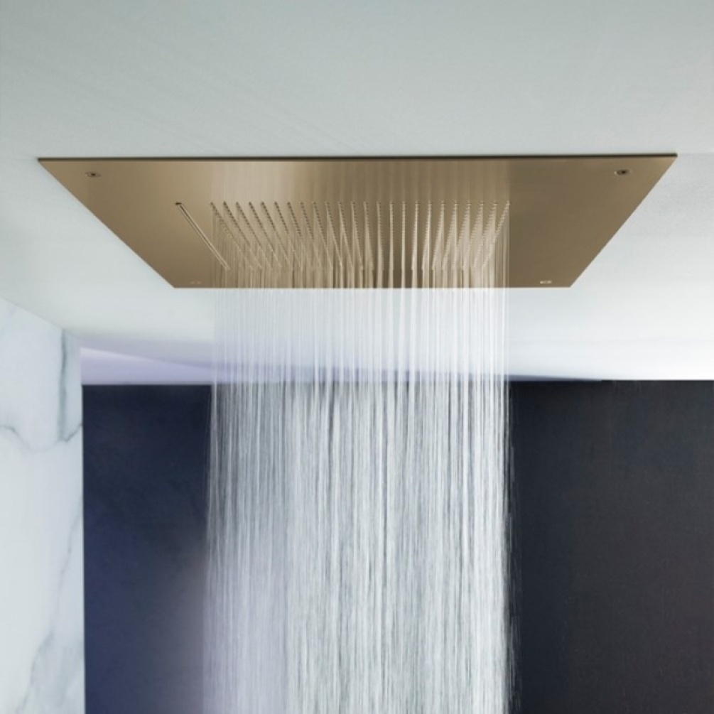 Product Lifestyle image of the Crosswater Tranquil 500 Brushed Brass Recessed Shower Head from a low angle
